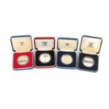 Four silver proof commemorative crowns/five pound coins with cases : For Further Condition Reports