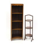 Mahogany three tier folding cake stand and an oak four shelf open bookcase, the bookcase 119cm H x