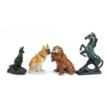 Four collectable china animals including USSR dog and Blue Mountain, the largest 29.5cm high : For