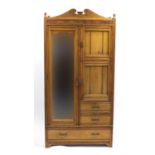 Edwardian satinwood compactum wardrobe with full length mirrored door, two cupboard doors and