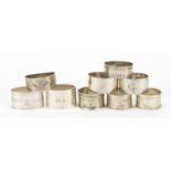 Nine silver napkin rings, various hallmarks, 265g : For Further Condition Reports Please Visit Our