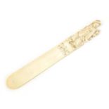 Chinese carved ivory page turner, 22cm in length : For Further Condition Reports Please Visit Our