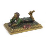 Austrian cold painted bronze figure of a boy smoking, 14cm wide : For Further Condition Reports