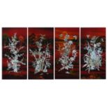 Set of four Chinese lacquered panels with mother of pearl inlay, each decorated and hand painted