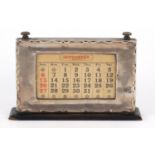 George V rectangular silver mounted and ebonised perpetual desk calendar by WJ Myatt & Co,