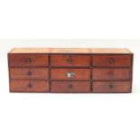 Industrial stained pine nine drawer chest, 38cm H x 115cm W x 29cm D : For Further Condition Reports