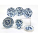 Three Meissen plates, shallow bowl, scallop dish and one other, each hand painted in the Blue