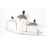 Art Deco design silver plated tea set on tray in the manner of Christopher Dresser with ebonised