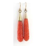 Pair of Victorian carved coral drop earrings with gold coloured metal mounts, 4.2cm in length, 3.