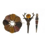 Three Scottish hardstone brooches including a silver dirk, the largest 4.5cm in diameter : For