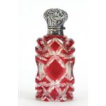 Victorian ruby flashed cut glass scent bottle with unmarked silver hinged lid, 9.5cm high : For