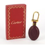 Cartier leather and gilt metal keyring with box, 10cm high : For Further Condition Reports Please