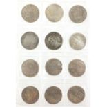 Twelve Chinese silver coloured metal coins : For Further Condition Reports Please Visit Our Website,