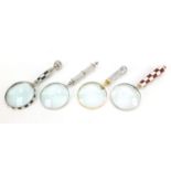 Four magnifying glasses with boxes, each 26cm in length : For Further Condition Reports Please Visit