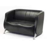 Contemporary black leather two seater settee with chromed legs, 77cm H x 122cm W x 58cm D : For