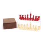 19th century English Staunton half stained carved ivory chess set with oak box, the largest pieces