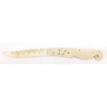 Scrimshaw style carved bone folding knife, 22cm in length : For Further Condition Reports Please