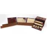 Chinese bone mahjong set with brass mounted chest and four stands, the chest 16.5cm H x 24cm W x