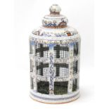 Large Italian faience glazed pottery bird cage, painted with flowers, 60cm high : For Further