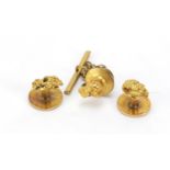 Pair of unmarked gold nugget studs and a lapel pin, (tests as 18ct gold+) the weight of the gold 5.