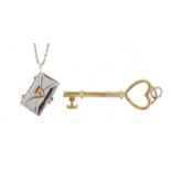 925 silver gilt key pendant and a purse 'I love you' pendant on chain, the key pendant 5.5cm wide,