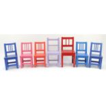 Seven colourful child's chairs, the largest 57cm high : For Further Condition Reports Please Visit