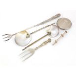 Silver and white metal flatware including a large Victorian silver handled toasting fork, two spoons