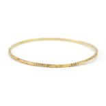 Unmarked gold bangle, (tests as 9ct gold) 6.5cm in diameter, 5.2g : For Further Condition Reports