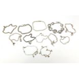 Twelve silver bracelets including charm bracelets, 89.0g : For Further Condition Reports Please
