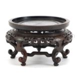 Good Chinese carved hardwood stand with foliate wire inlay, 11cm high x 16.5cm in diameter : For