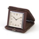 Art Deco folding travel clock with silvered dial, having Arabic numerals, 9.5cm x 9.5cm : For