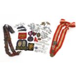 Vintage and later badges, cloth patches and sashes including The Salvation Army and Swiss badges