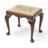 Queen Anne style walnut stool with needlepoint upholstered seat and shell carved knees on cabriole