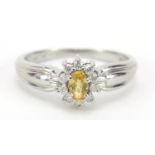 Platinum yellow stone and diamond ring, IW maker's mark, size P, 4.9g : For Further Condition