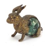 Early 20th century sewing interest brass and Bakelite tape measure in the form of a hare, 4.5cm high
