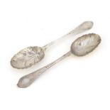 Near pair of Georgian silver tablespoons, the bowls embossed with berries, indistinct hallmarks, the