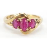 9ct gold ruby three stone crossover ring, size M, 2.8g : For Further Condition Reports Please