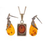 Silver and amber pendant on chain with matching earrings, the earrings 3cm in length, 8.0g : For
