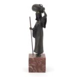 Cold painted bronze of a girl holding a jug in the style of Franz Xaver Bergmann, raised on a square