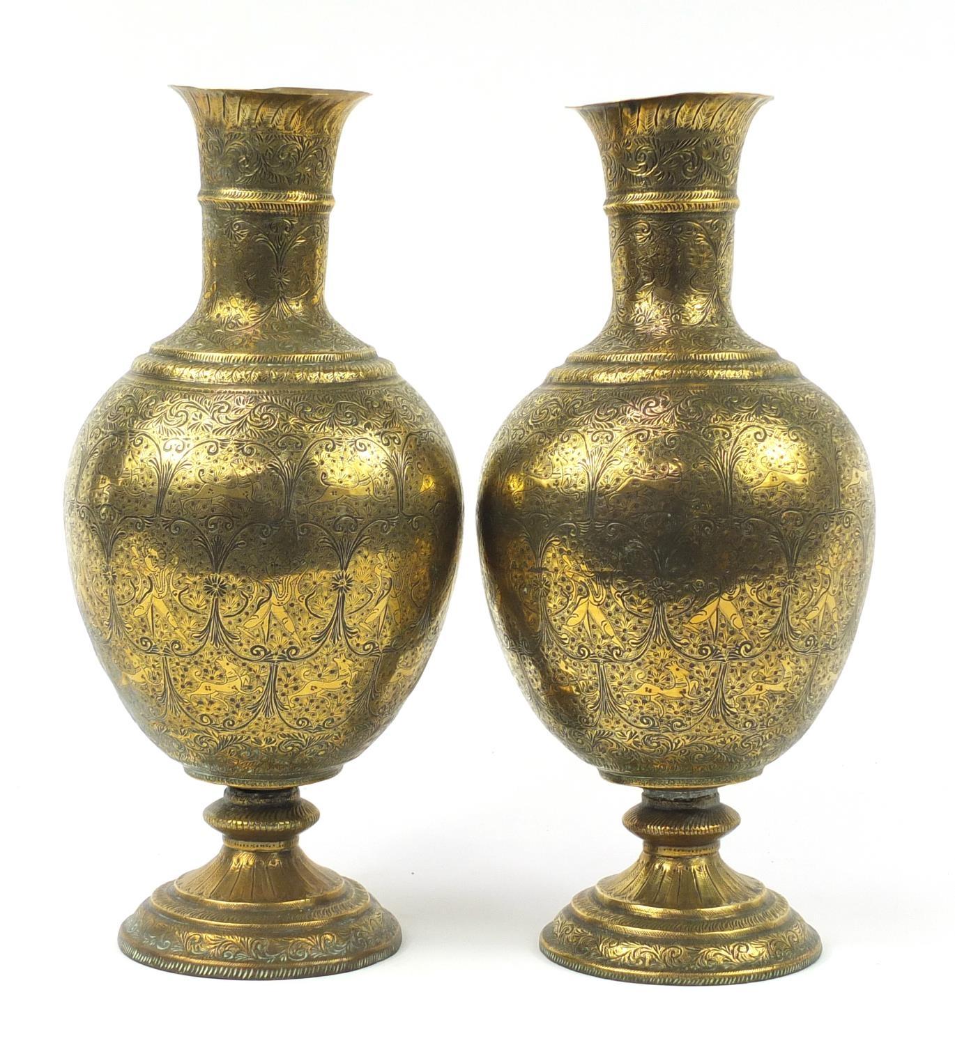 Large pair of Indian brass vases engraved with figures, animals and flowers, each 53cm high : For - Image 3 of 8