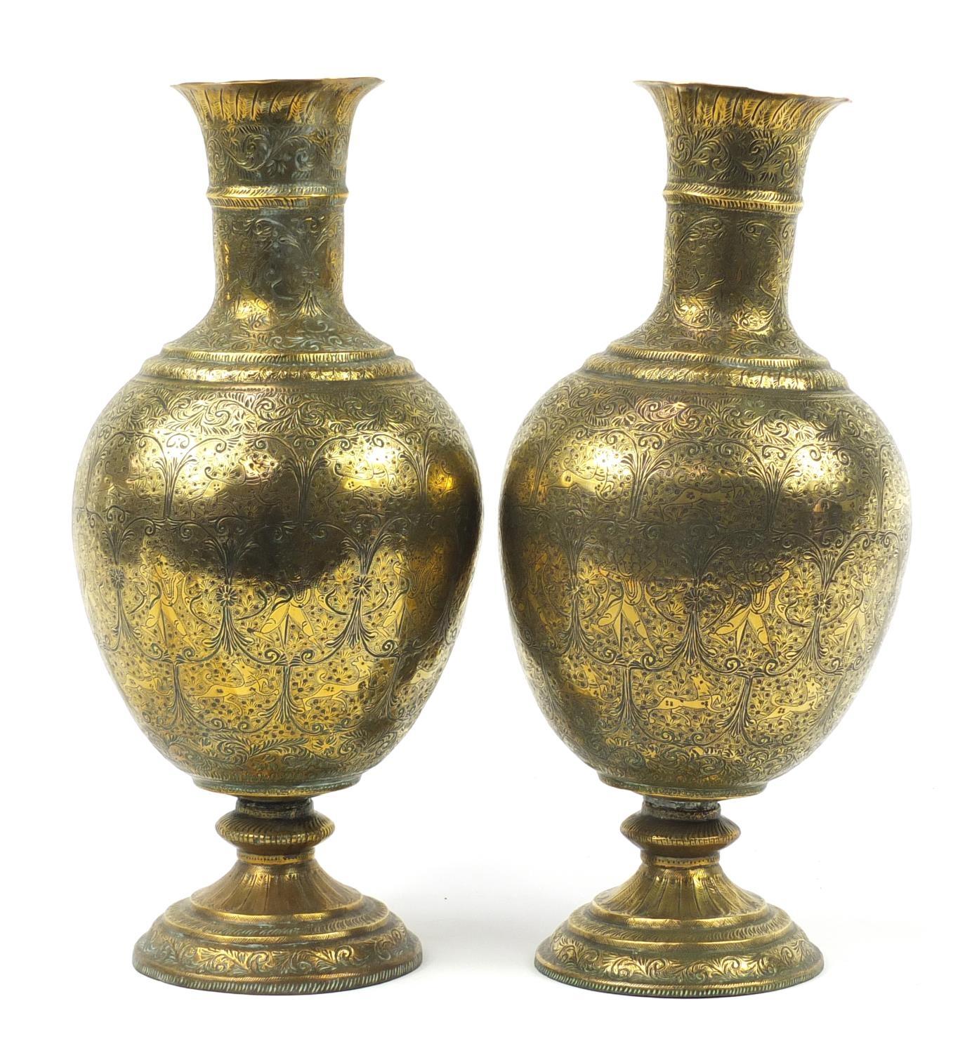 Large pair of Indian brass vases engraved with figures, animals and flowers, each 53cm high : For - Image 4 of 8