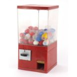 Vintage toy vending machine enclosing egg containers with badges, 50.5cm x 25.5cm W x 25.5cm D : For