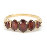 9ct gold graduated garnet five stone ring, size U, 3.1g : For Further Condition Reports Please Visit