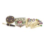 Antique and later objects comprising an 18th century beadwork cover, bone bobbins, treen needle case