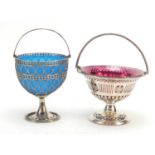 Two silver plated sugar baskets with swing handles and glass liners, including one by Cooper Bros