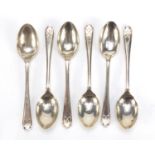 Set of six golfing interest silver teaspoons by Walker & Hall, Sheffield 1933, 11cm in length, 81.0g