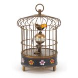 Brass and enamel clockwork automaton bird cage clock, 19.5cm high : For Further Condition Reports