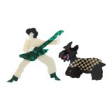 Two Lea Stein style brooches in the form of a rock star and scottie dog, the largest 9cm high :