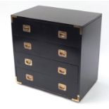 Ebonised campaign style four drawer chest with brass mounts and inset handles, 72cm H x 70cm W x