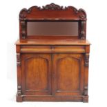 Victorian mahogany chiffonier with mirrored back above a frieze drawer and pair of cupboard doors,